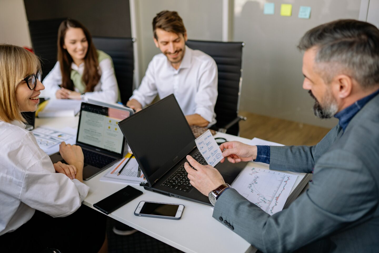 people at a table having a meeting